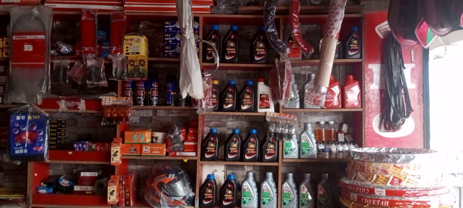 Engine oils — Havoline, Caltex M2, Kixx — and accessories